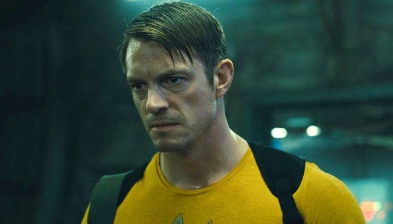 Joel Kinnaman teases fans, staying cryptic about Rick Flag Jr.'s return.