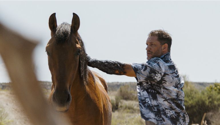 Tom Hardy hints at a Logan-style Venom film, exciting fans despite hints of his departure.