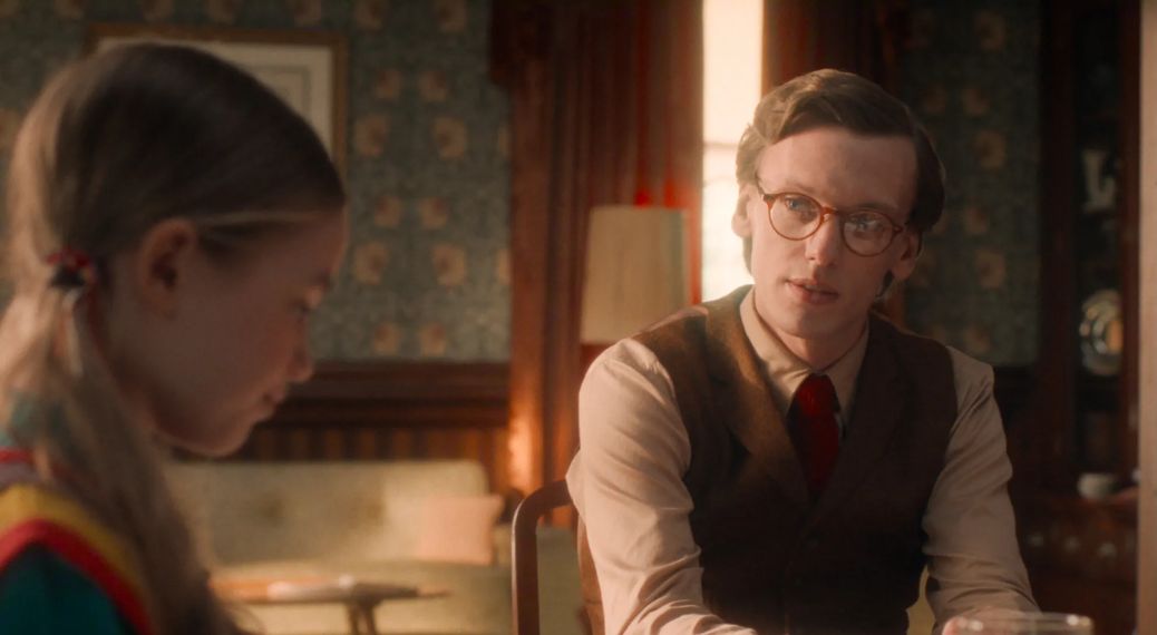 Nell Fisher as Holly Wheeler and Jamie Campbell Bower as Mr. Whatsit in 'Stranger Things' season 5